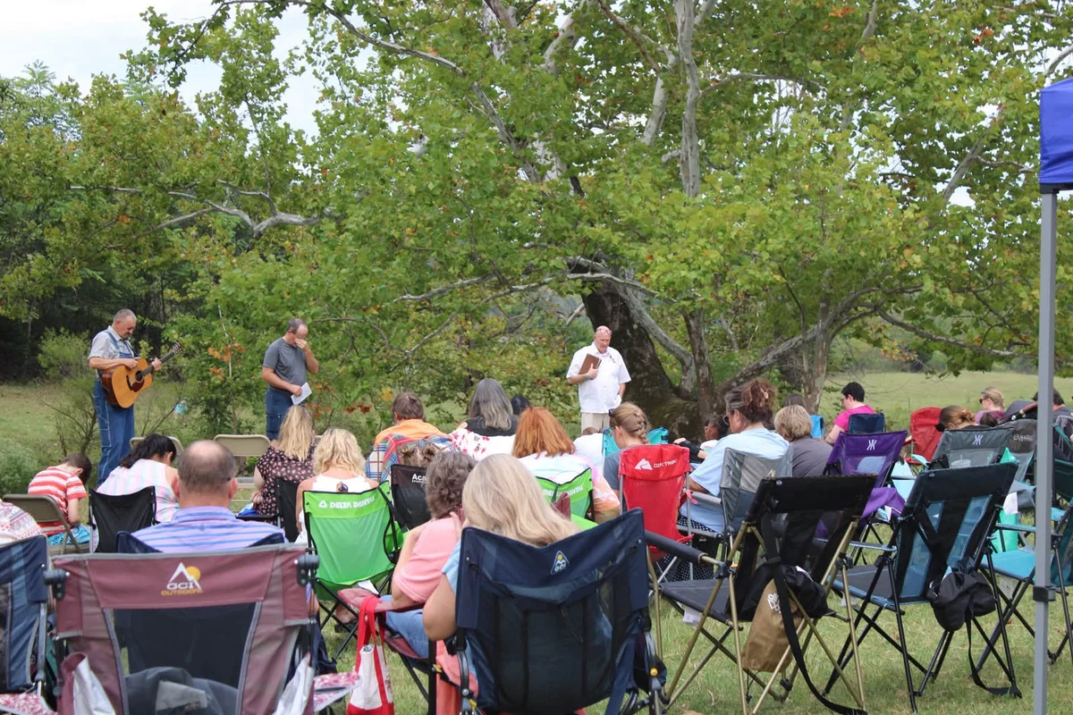 Members of Open Door gathered for outdoor fellowship
